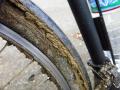 The backwheel collected a lot of mud.